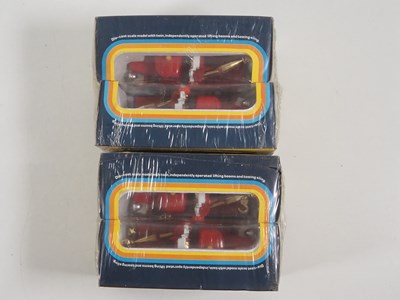 Lot 559 - A pair of CORGI #1144 trade packs each...