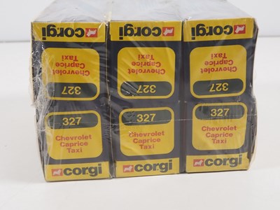 Lot 563 - A CORGI trade pack containing x6 #327...