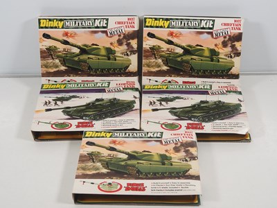Lot 574 - A group of DINKY metal kits, as new in...