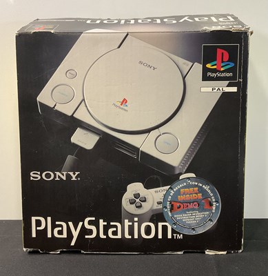Lot 631 - A boxed Sony PLAYSTATION ONE (PS1) console,...