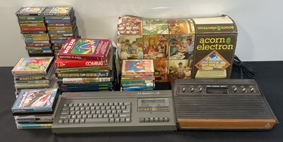 Lot 662 - A group of retro gaming computers and games...