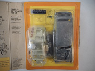 Lot 44 - A group of DINKY metal kits, as new in...