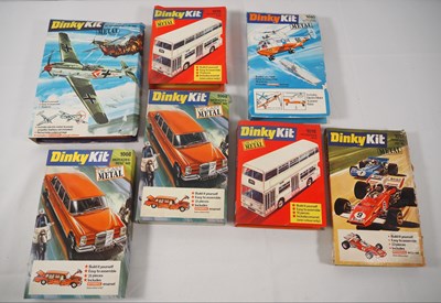 Lot 103 - A group of DINKY metal kits, as new in...