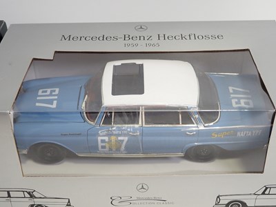 Lot 234 - A group of 1:18 scale diecast cars by REVELL,...