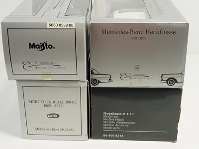 Lot 234 - A group of 1:18 scale diecast cars by REVELL,...