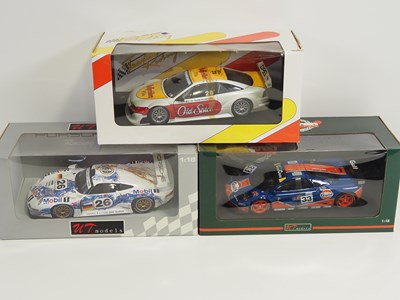 Lot 237 - A group of UT MODELS 1:18 scale diecast race...