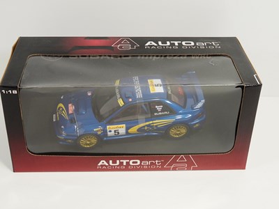 Lot 239 - An AUTOART 1:18 scale diecast Subaru Impreza...