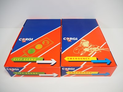 Lot 258 - A pair of CORGI Juniors shop display packs,...