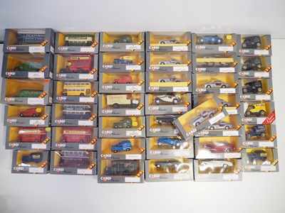 Lot 312 - A group of CORGI Classics vans, cars and other...