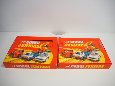 Lot 396 - A pair of CORGI JUNIORS shop display boxes,...