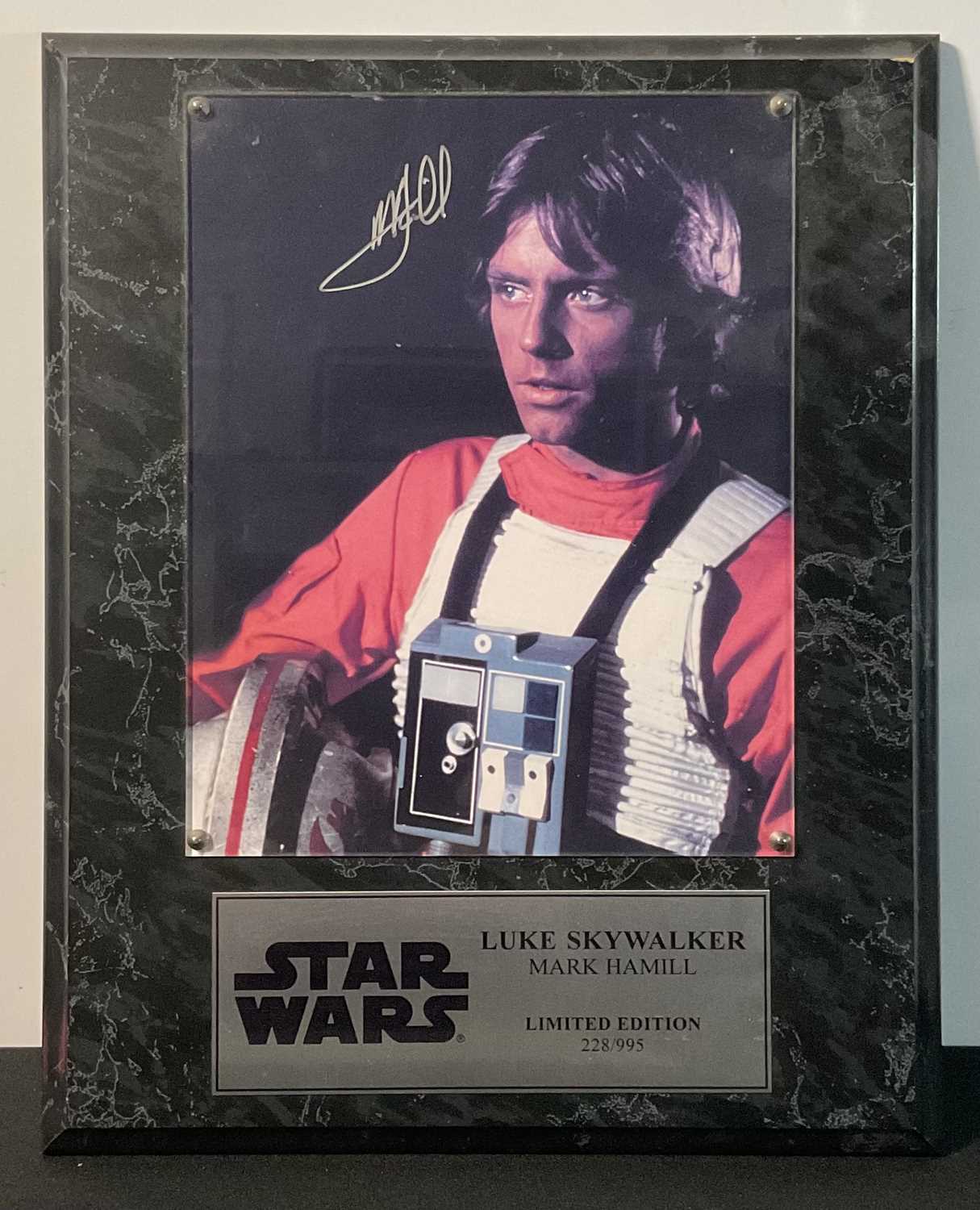 Lot 761 - STAR WARS: A mounted MARK HAMILL signed...