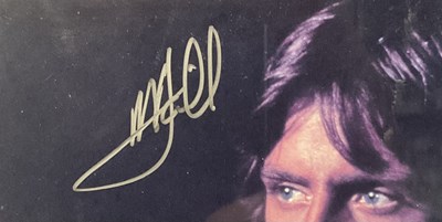 Lot 761 - STAR WARS: A mounted MARK HAMILL signed...