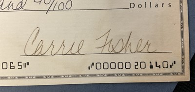 Lot 760 - STAR WARS: A CARRIE FISHER autographed cheque...