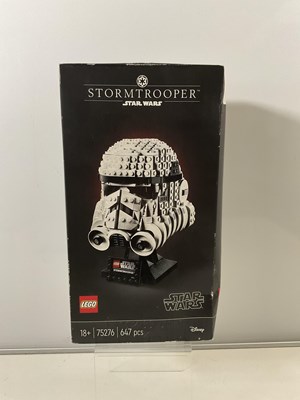 Lot 712 - A LEGO STAR WARS Stormtrooper Helmet set 75276....