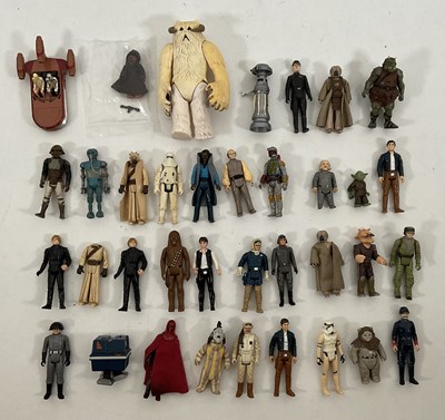 Lot 719 - A large group of STAR WARS figures by Kenner /...