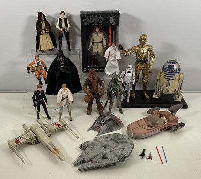 Lot 682 - STAR WARS: A group of Star Wars collectables...