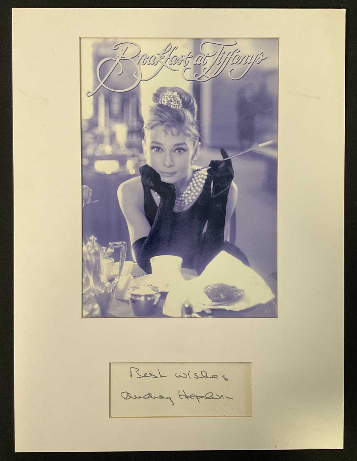 Lot 565 - AUDREY HEPBURN autograph in a display...