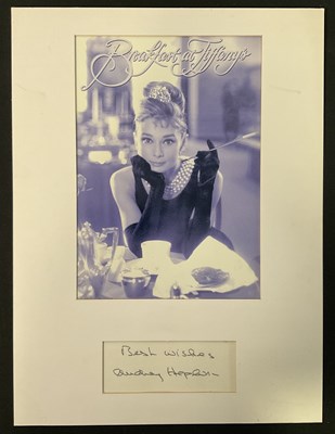 Lot 565 - AUDREY HEPBURN autograph in a display...