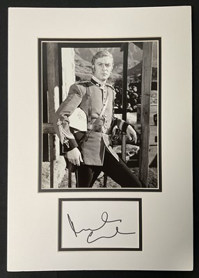 Lot 564 - MICHAEL CAINE - An autograph card signed by...