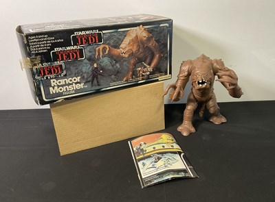Lot 725 - STAR WARS: A Rancor Monster figurine by...
