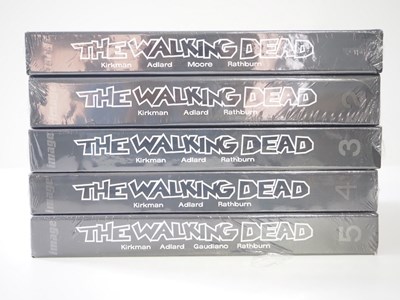 Lot 252 - THE WALKING DEAD DELUXE HARDCOVER OMNIBUS VOL....