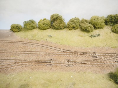 Lot 21 - A HOe / OO9 model railway layout of a yard /...