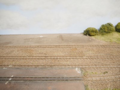 Lot 21 - A HOe / OO9 model railway layout of a yard /...