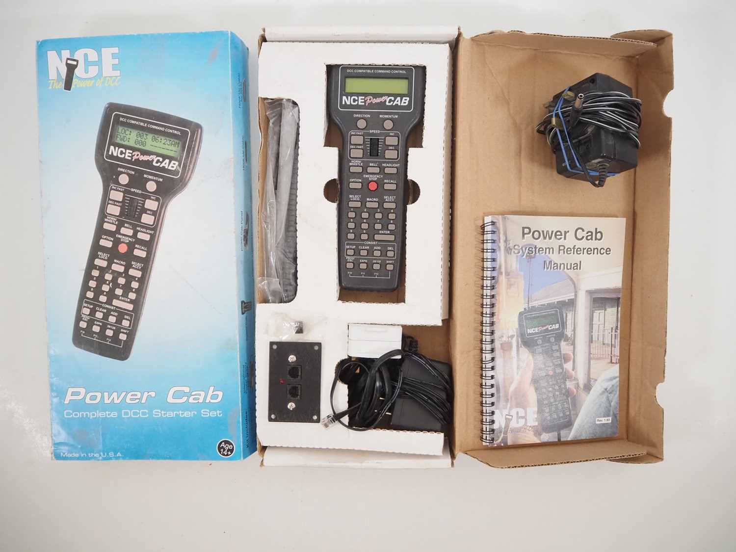 Lot 22 - A complete NCE Powercab DCC control system in...