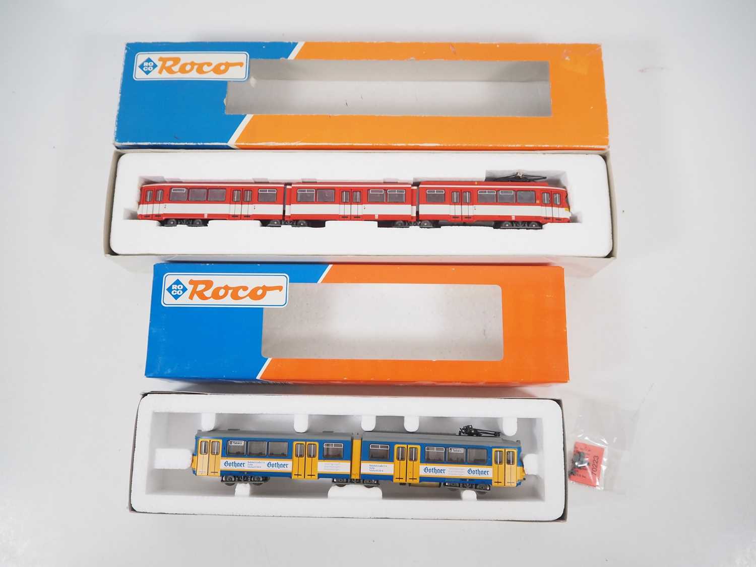 Lot 24 - A pair of ROCO HO gauge Duwag tram cars...