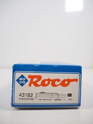 Lot 24 - A pair of ROCO HO gauge Duwag tram cars...