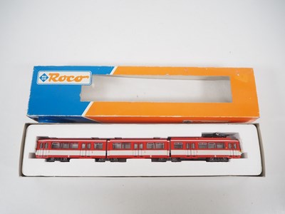Lot 24 - A pair of ROCO HO gauge Duwag tram cars...
