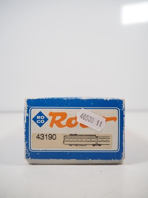 Lot 25 - A pair of ROCO HO gauge 3-car Duwag tram cars...