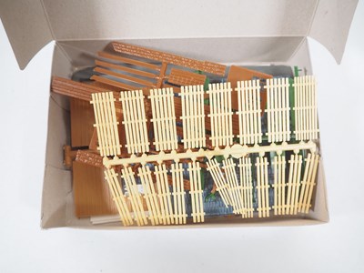 Lot 27 - A group of HO gauge kitbuilt plastic buildings...