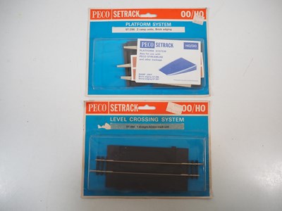 Lot 34 - A group of OO gauge plastic building kits and...