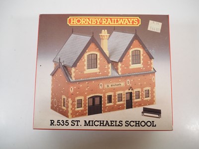 Lot 34 - A group of OO gauge plastic building kits and...