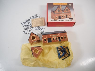 Lot 34 - A group of OO gauge plastic building kits and...