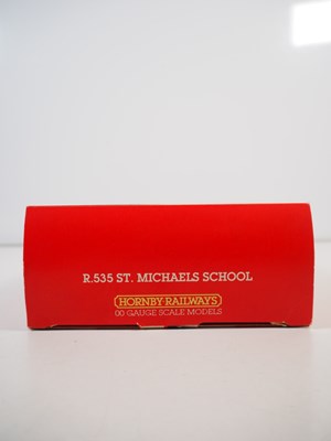 Lot 34 - A group of OO gauge plastic building kits and...