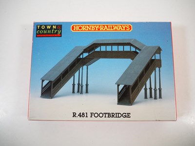 Lot 34 - A group of OO gauge plastic building kits and...