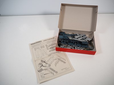 Lot 34 - A group of OO gauge plastic building kits and...