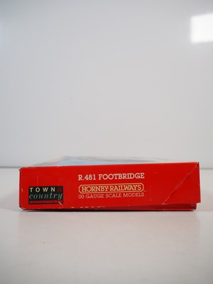 Lot 34 - A group of OO gauge plastic building kits and...