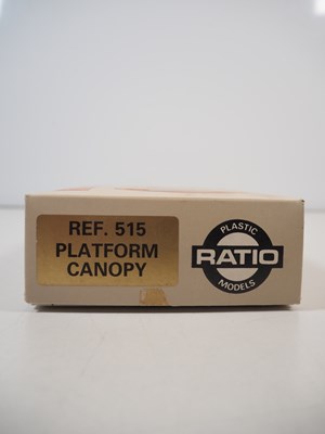 Lot 34 - A group of OO gauge plastic building kits and...