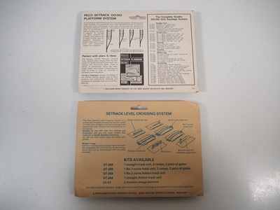 Lot 34 - A group of OO gauge plastic building kits and...