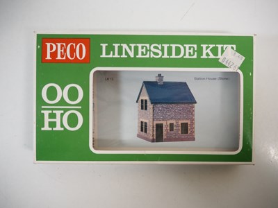 Lot 34 - A group of OO gauge plastic building kits and...