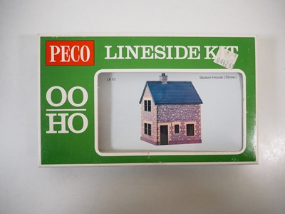 Lot 34 - A group of OO gauge plastic building kits and...
