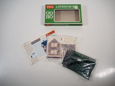 Lot 34 - A group of OO gauge plastic building kits and...