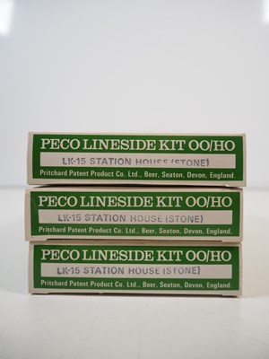 Lot 34 - A group of OO gauge plastic building kits and...