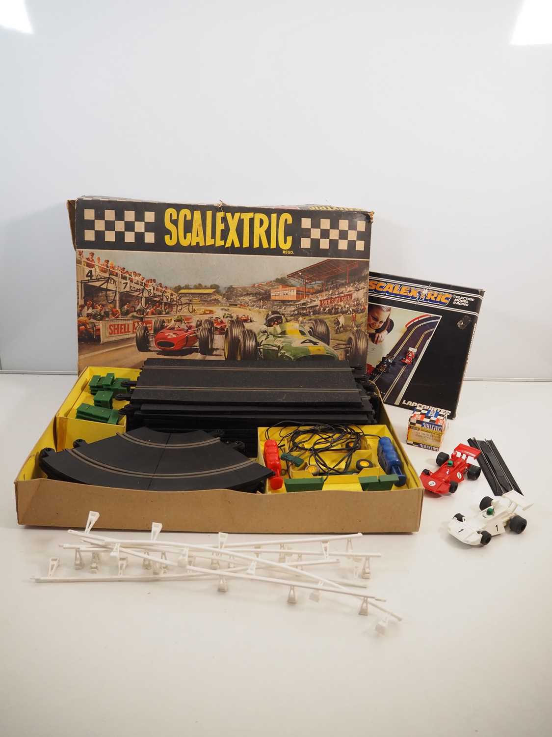 Lot 300 - A vintage SCALEXTRIC set, appears complete,