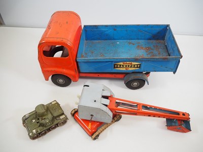 Lot 315 - A group of vintage tinplate toys comprising a...