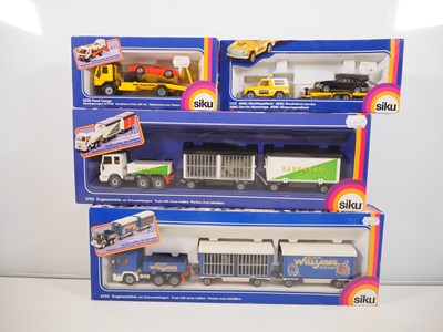 Lot 347 - A group of SIKU 1:50 scale diecast lorries and...