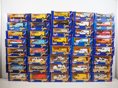 Lot 380 - A group of CORGI diecast cars and vans in blue...